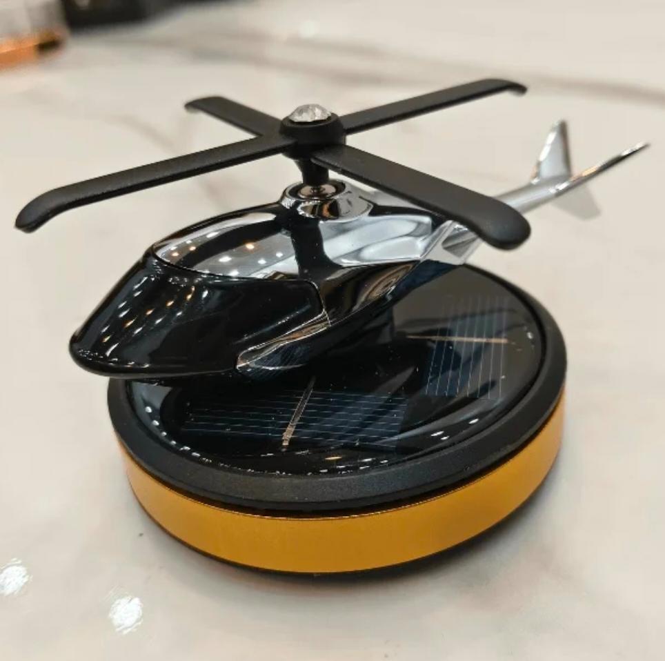 DECORA™ Solar Chopper – Rotating Stealth Helicopter Car Decor