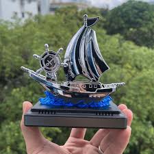 DECORA™ Solar Voyager – Blue Metallic Rotating Sailing Ship Decor